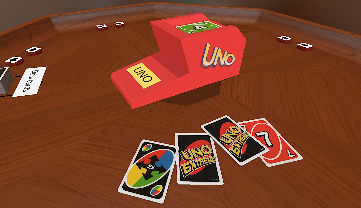 A screenshot from the tabletop simulator game. A selection of uno game cards are on the table next to a red block that launches the cards on a button press.